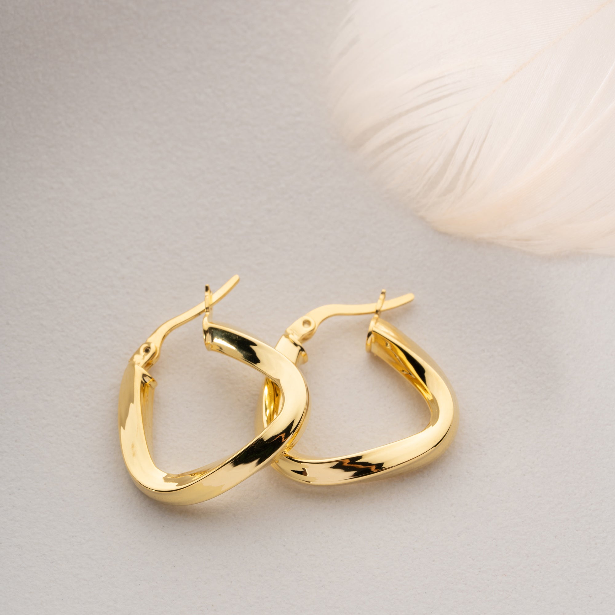 ASYMMETRISKA GULDSPIRALÖRHÄNGEN | 925 SILVER