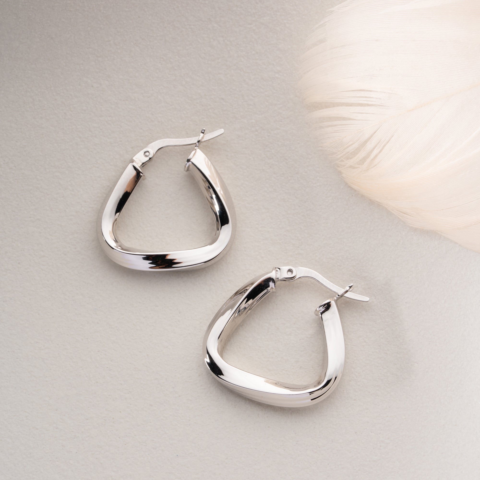 ASYMMETRISKA SPIRALÖRHÄNGEN | 925 SILVER