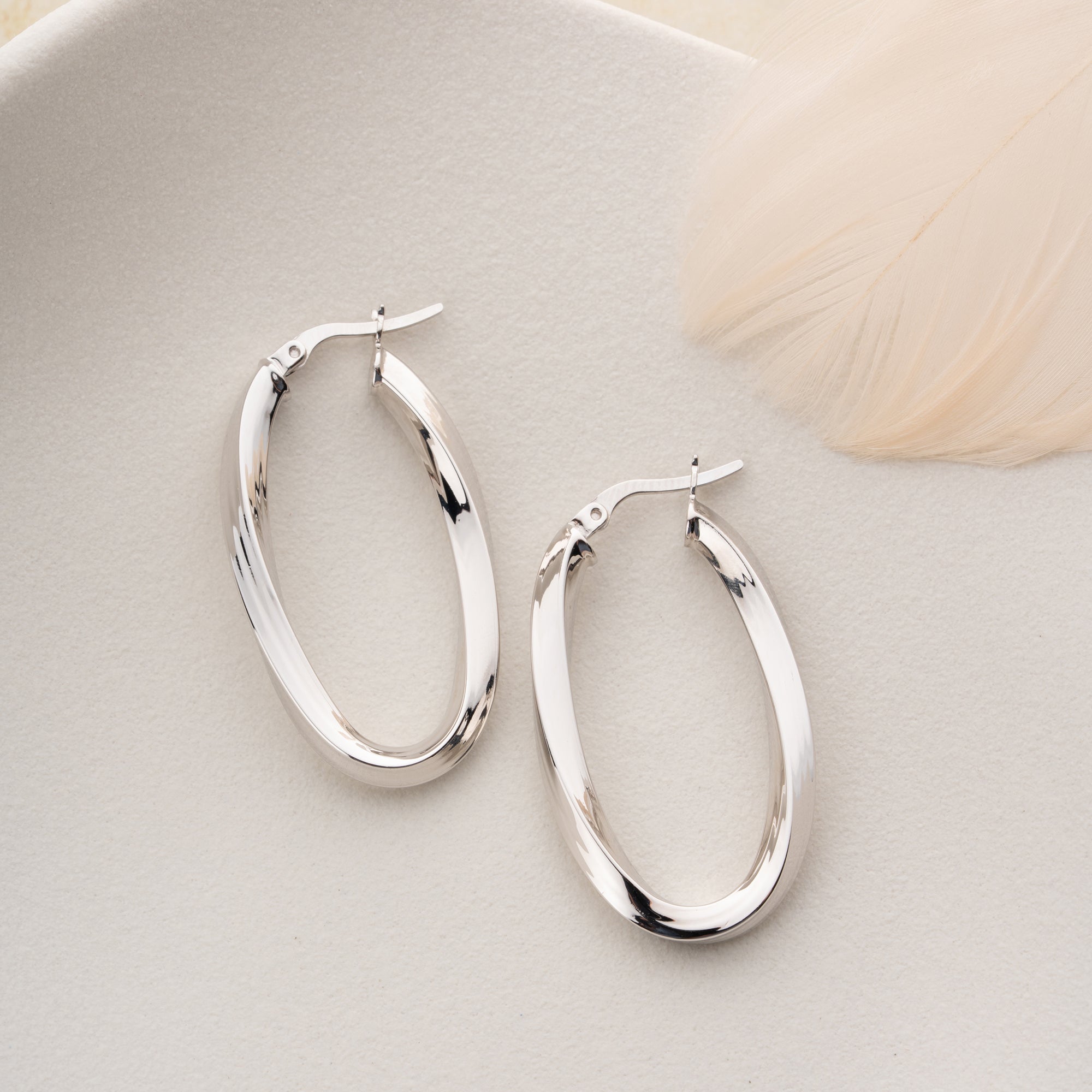 OVALA SPIRALÖRHÄNGEN | 925 SILVER