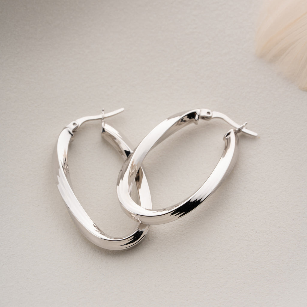 OVALA SPIRALÖRHÄNGEN | 925 SILVER
