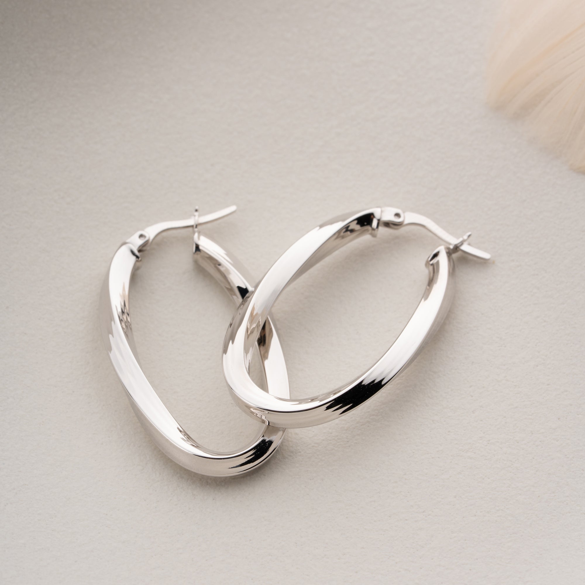 OVALA SPIRALÖRHÄNGEN | 925 SILVER
