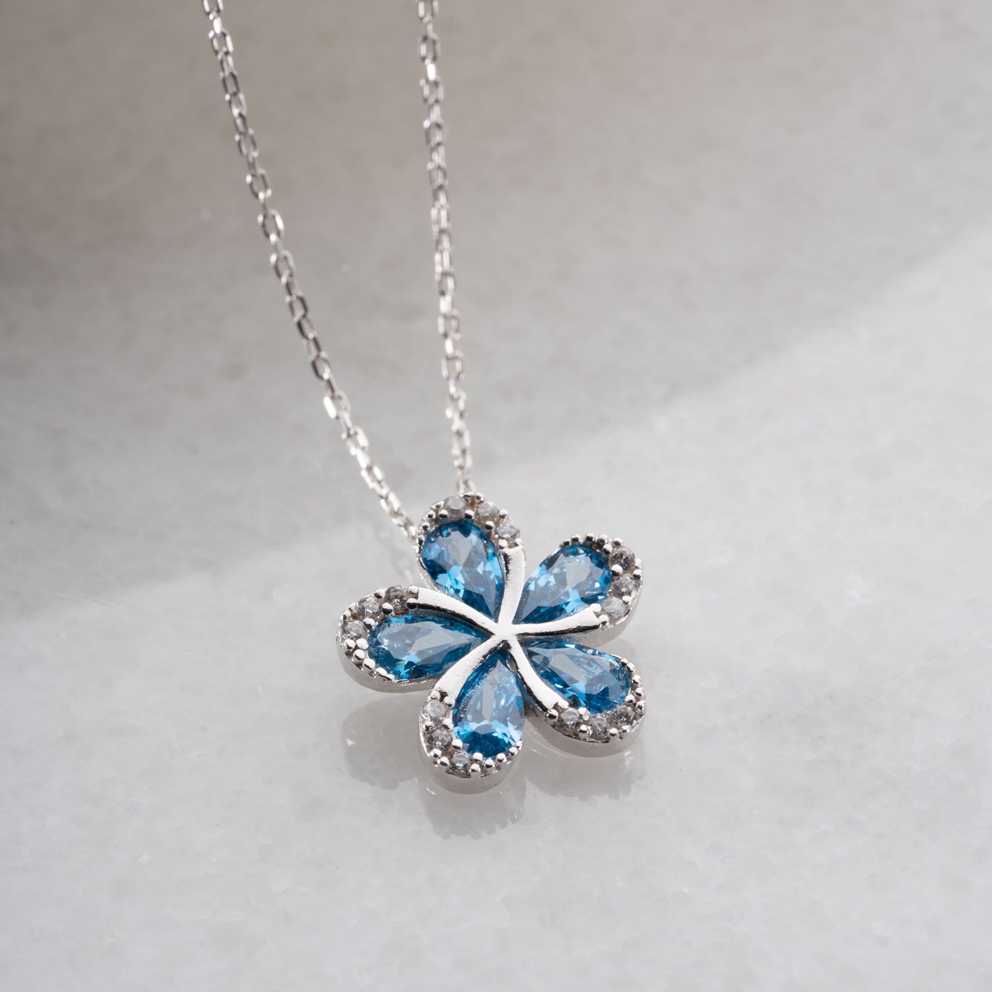 BLOMHALSBAND MED BLÅ ZIRKON | 925 SILVER