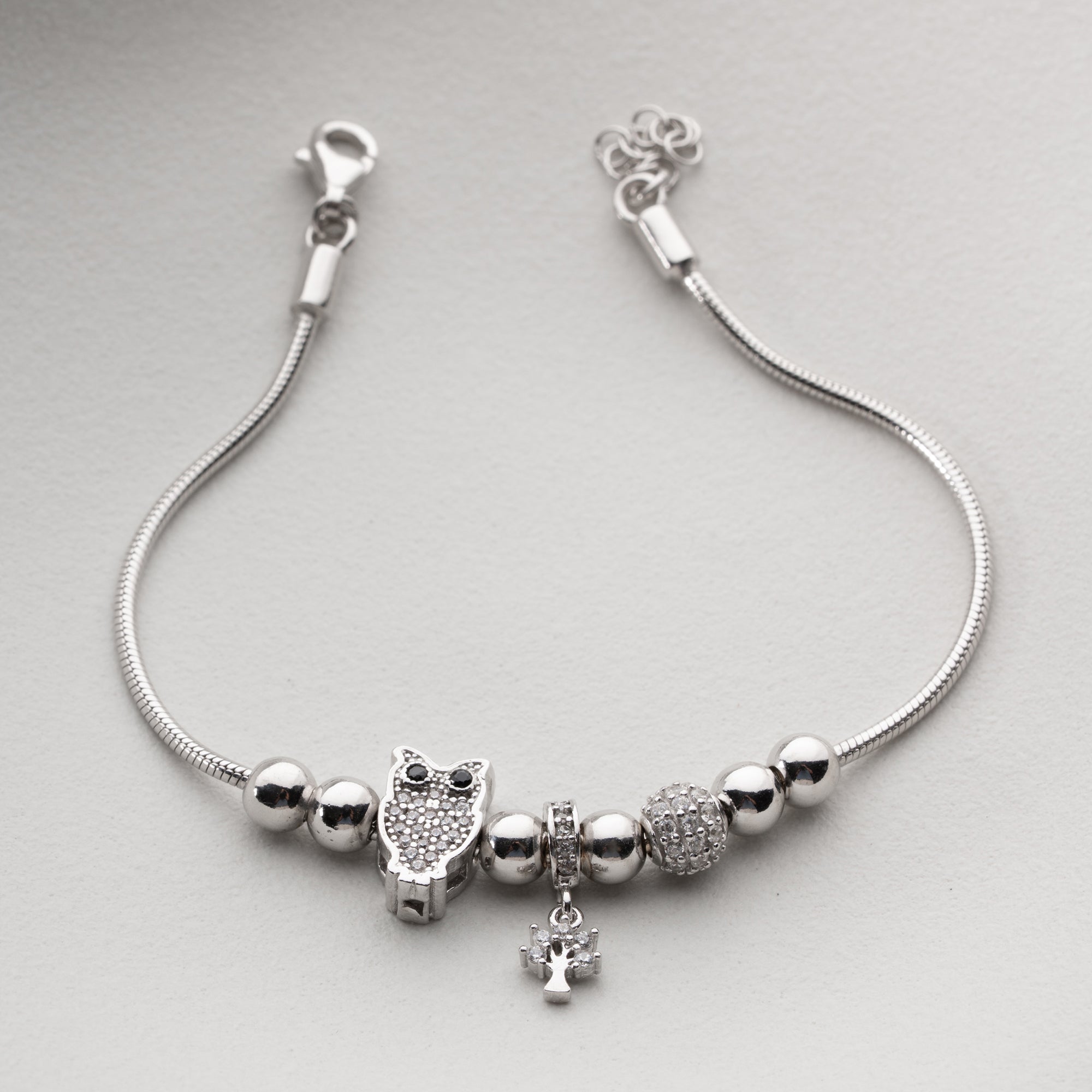 CHARMARMBAND MED UGGLA | 925 SILVER