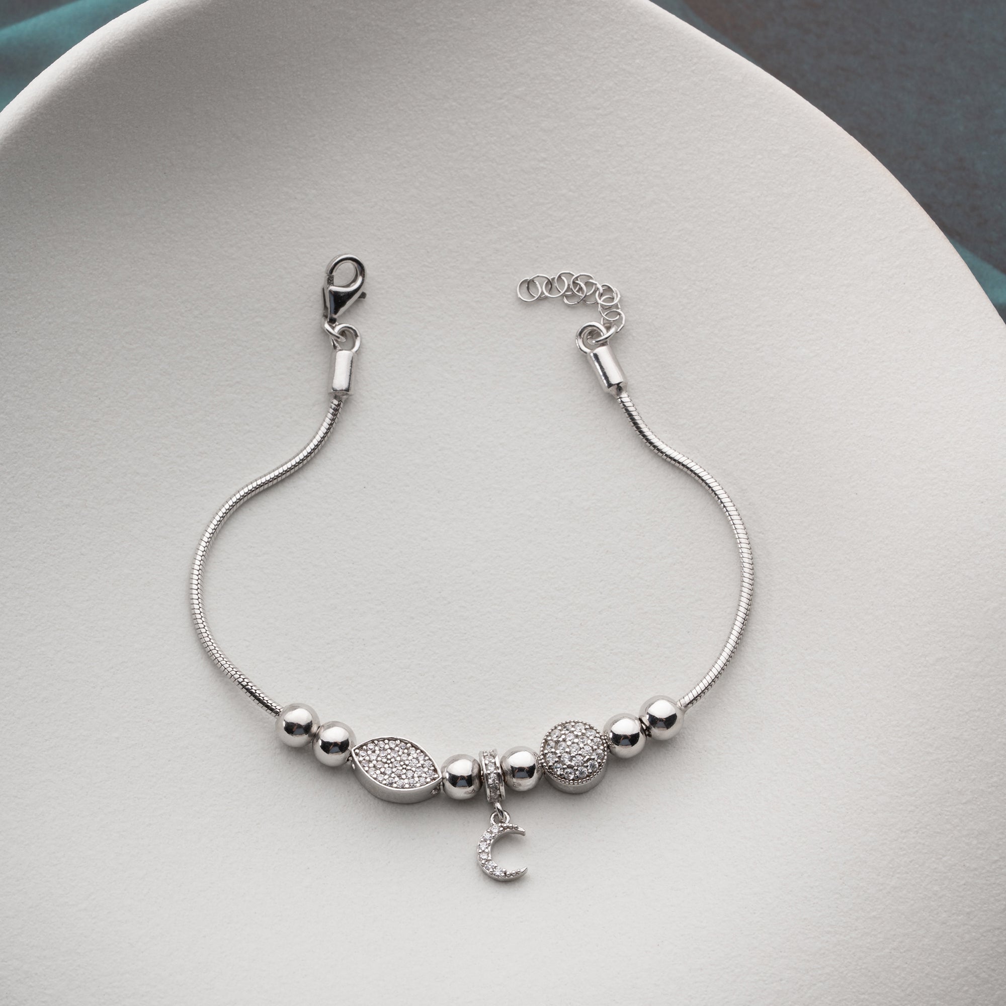 CHARMARMBAND MED HALVMÅNE | 925 SILVER