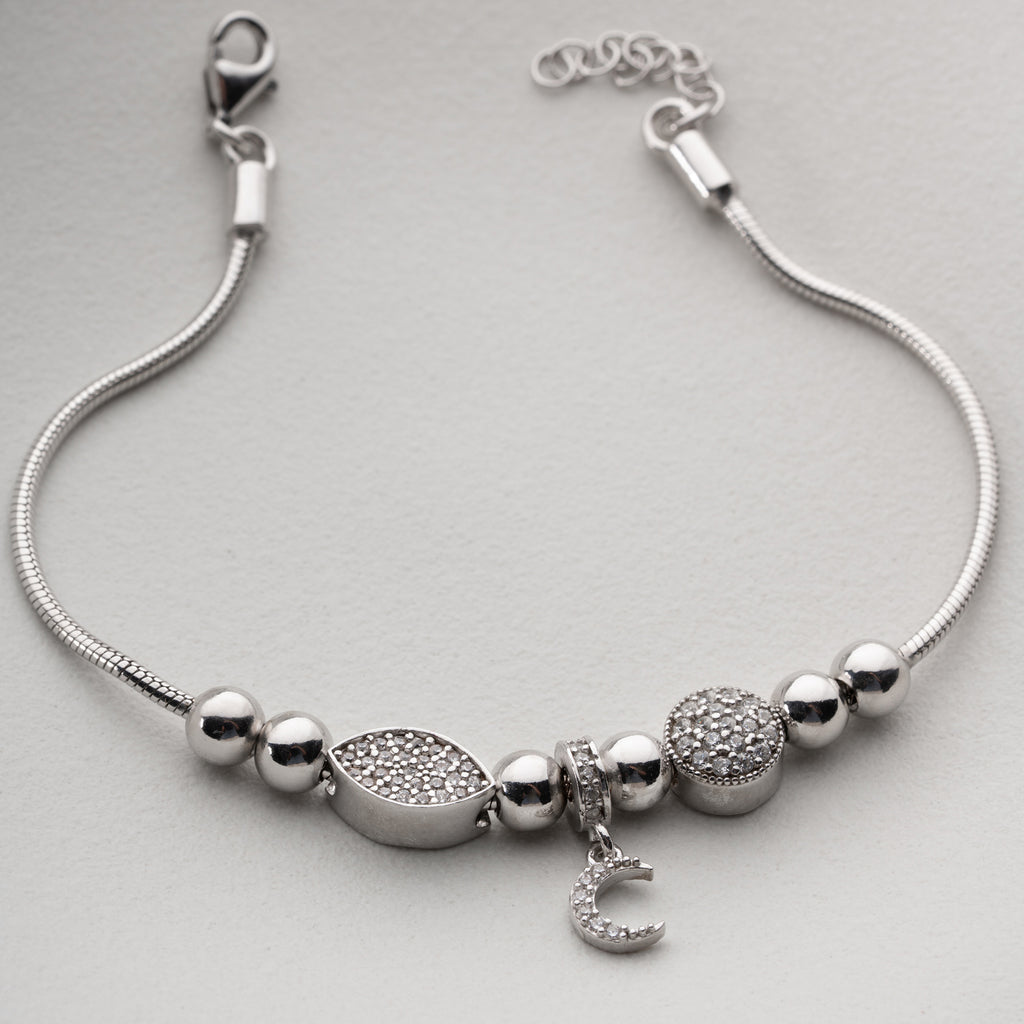 CHARMARMBAND MED HALVMÅNE | 925 SILVER