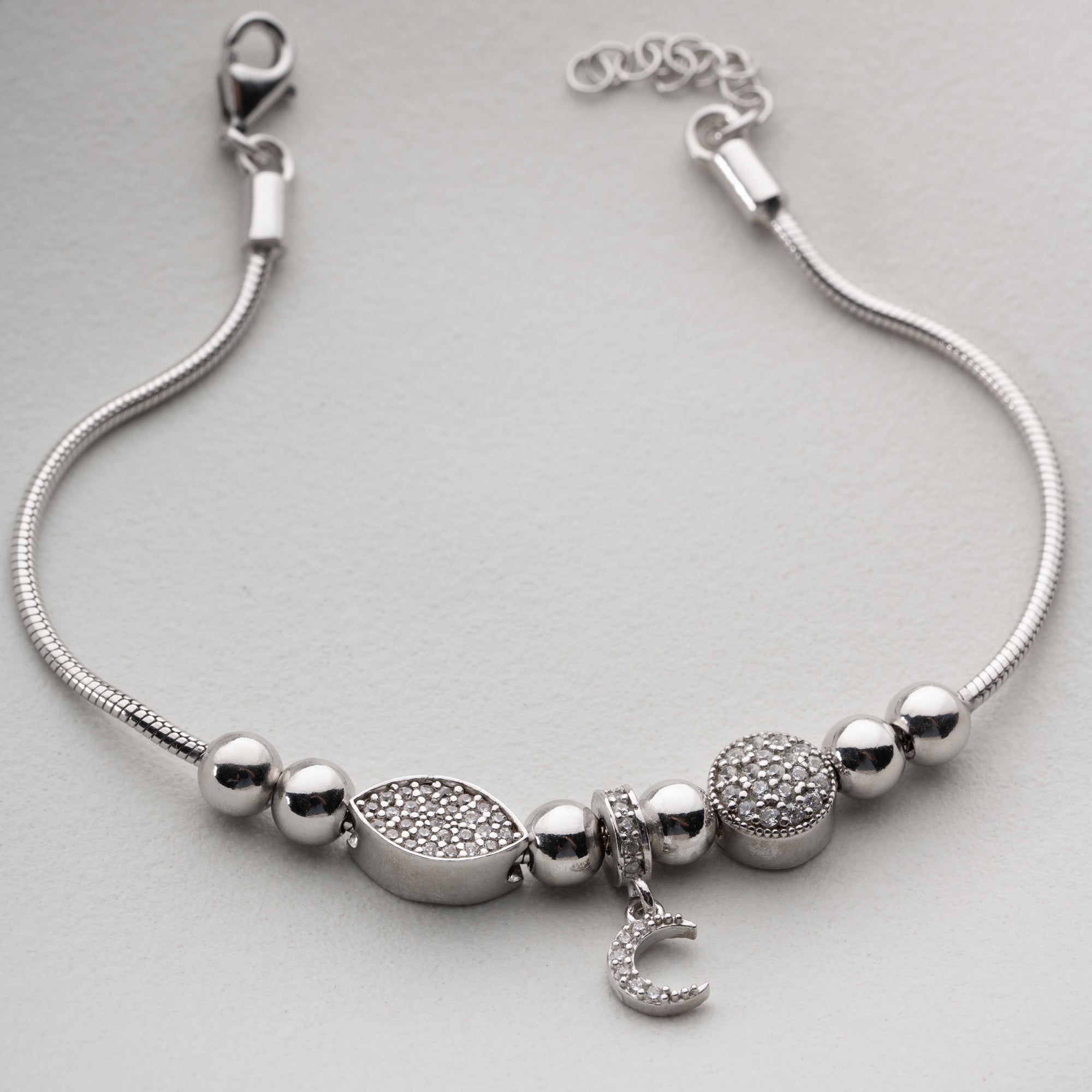 CHARMARMBAND MED HALVMÅNE | 925 SILVER
