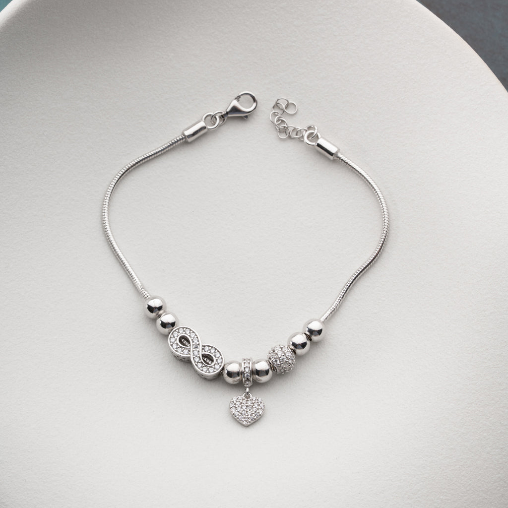 CHARMARMBAND MED ZIRKONHJÄRTA | 925 SILVER