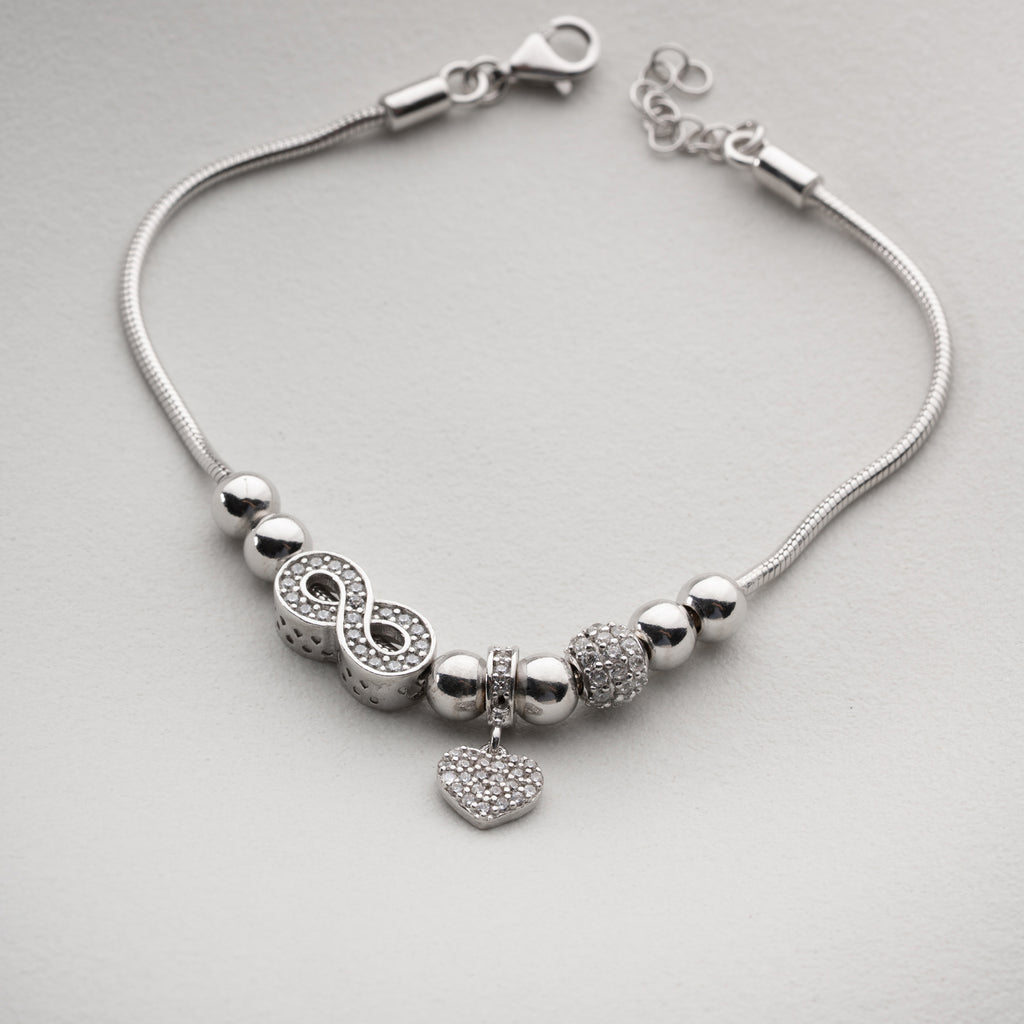 CHARMARMBAND MED ZIRKONHJÄRTA | 925 SILVER