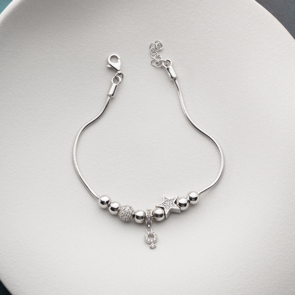 STJÄRNCHARMARMBAND MED ZIRKONER | 925 SILVER