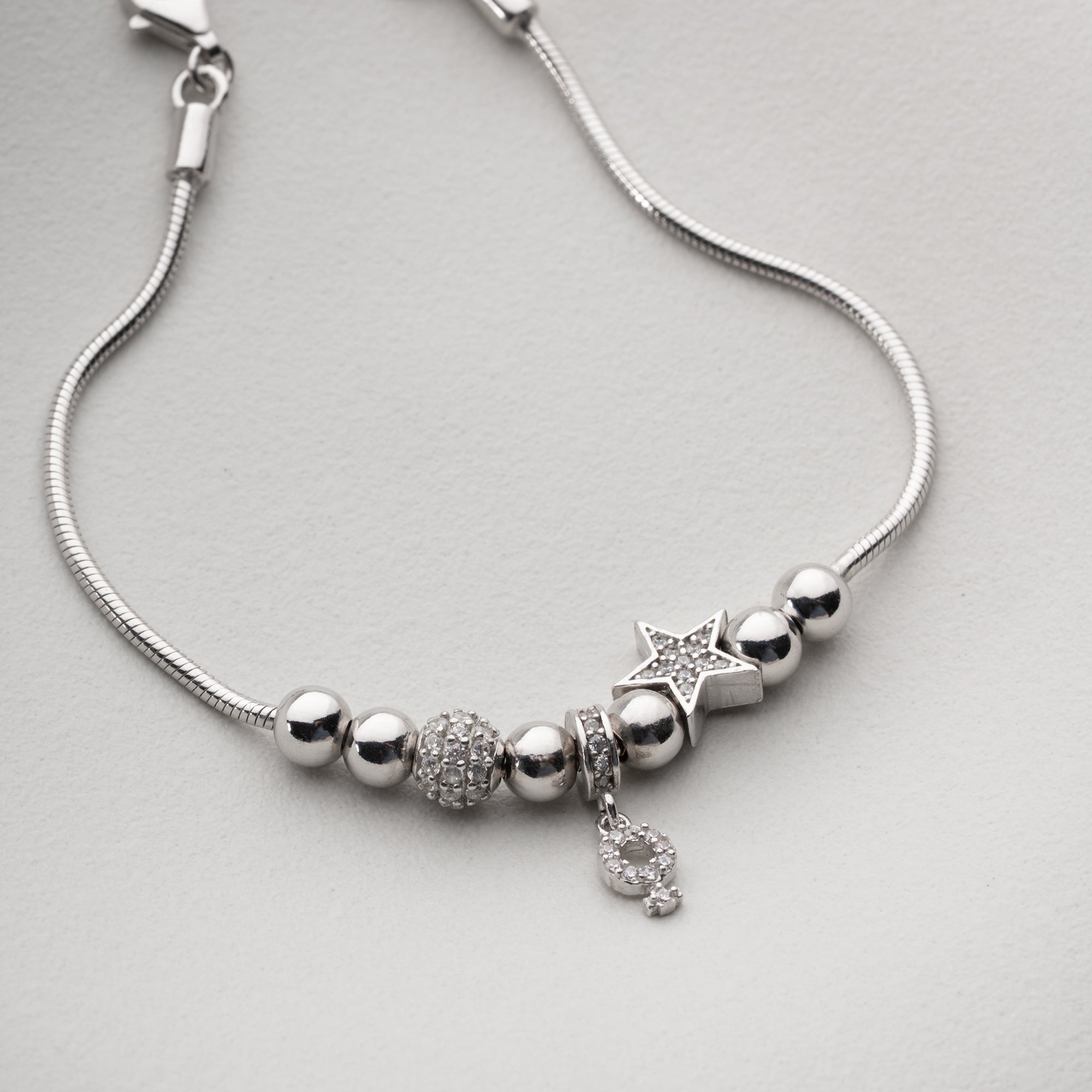 STJÄRNCHARMARMBAND MED ZIRKONER | 925 SILVER