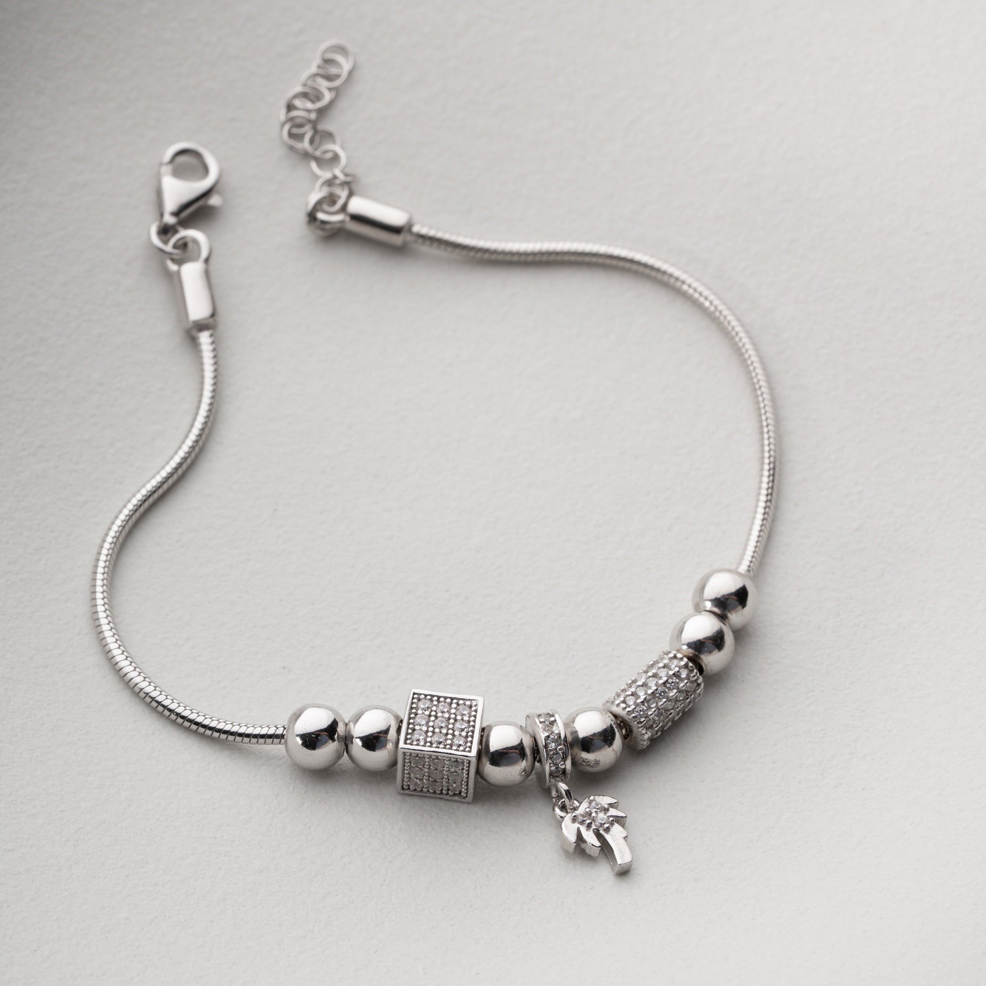 CHARMARMBAND MED PALMBERLOCK | 925 SILVER