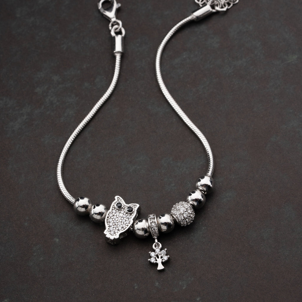 CHARMARMBAND MED UGGLA | 925 SILVER