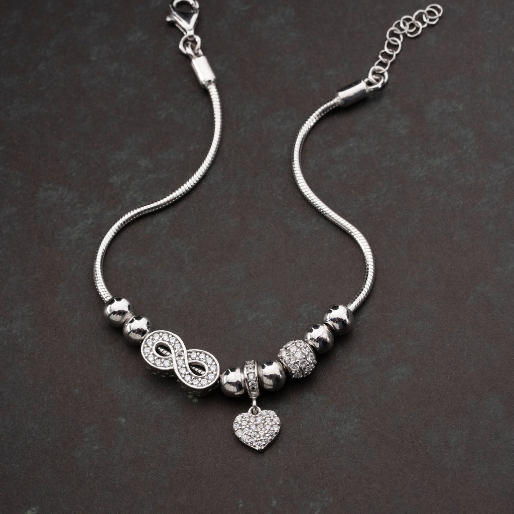 CHARMARMBAND MED ZIRKONHJÄRTA | 925 SILVER