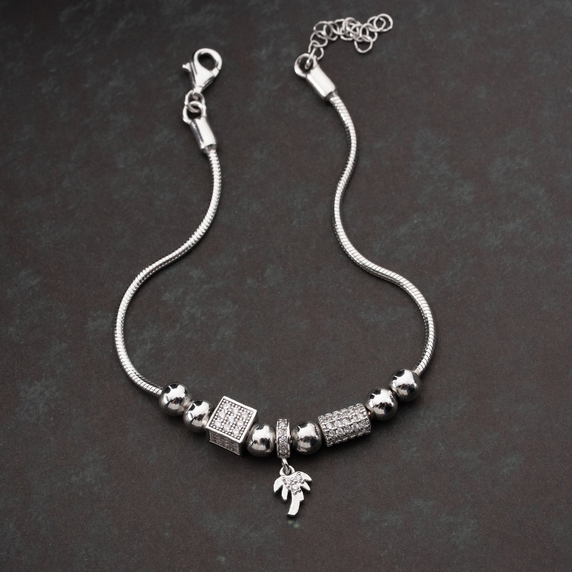 CHARMARMBAND MED PALMBERLOCK | 925 SILVER