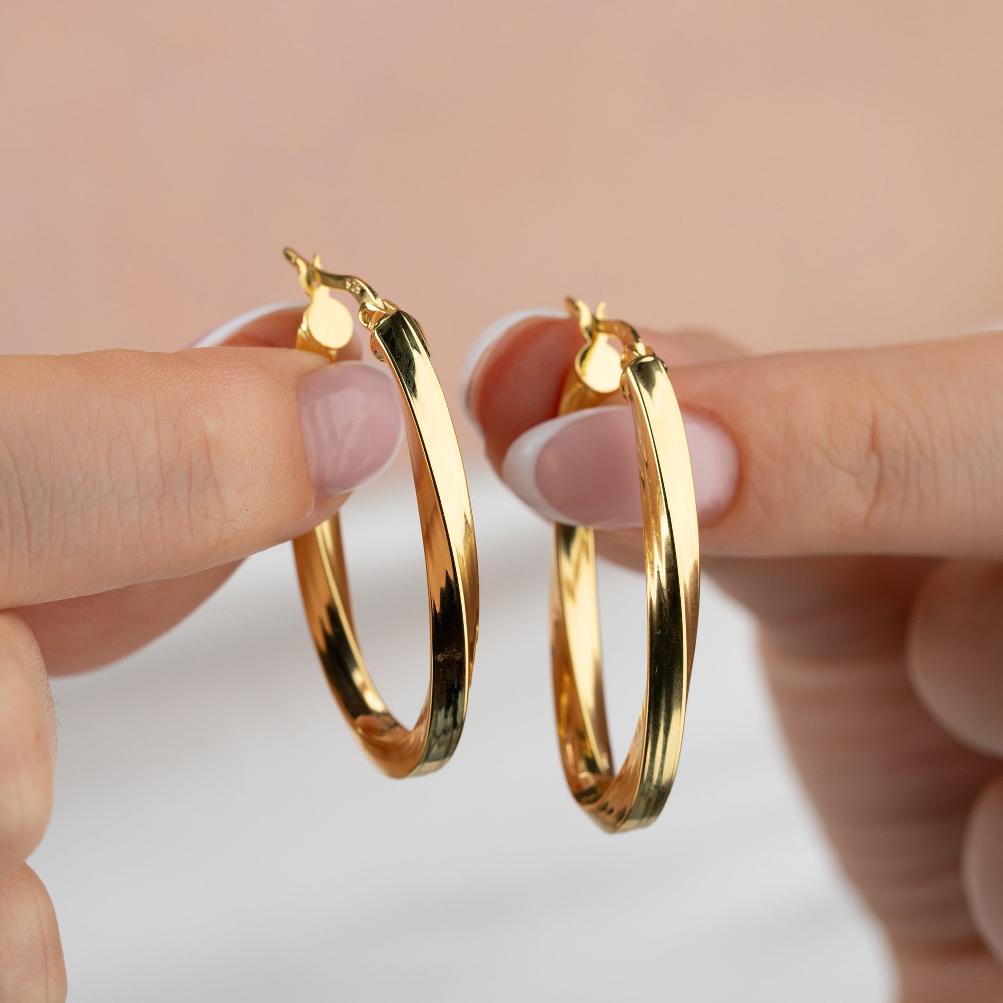 OVALA SPIRALGULD ÖRHÄNGEN | 925 SILVER
