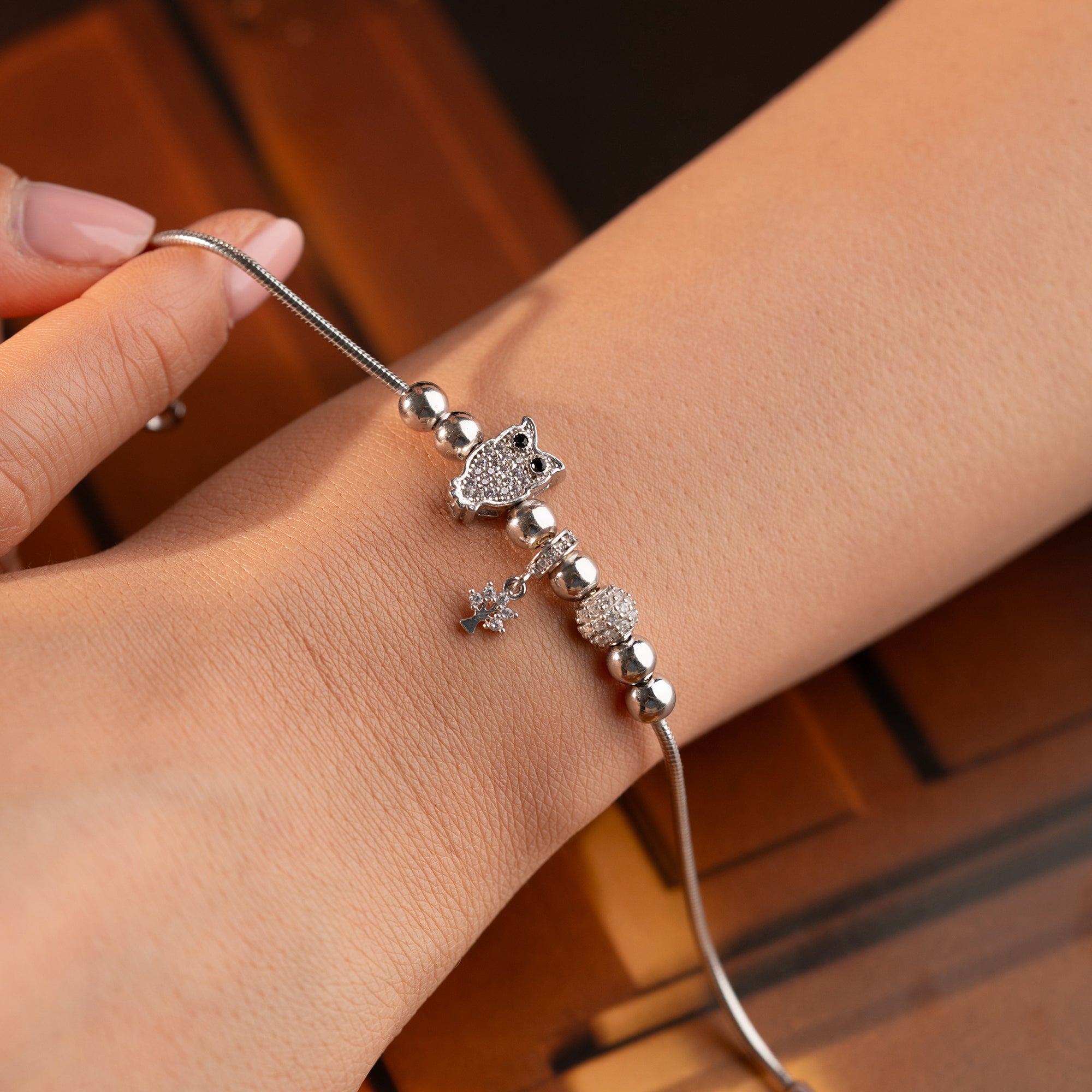 CHARMARMBAND MED UGGLA | 925 SILVER