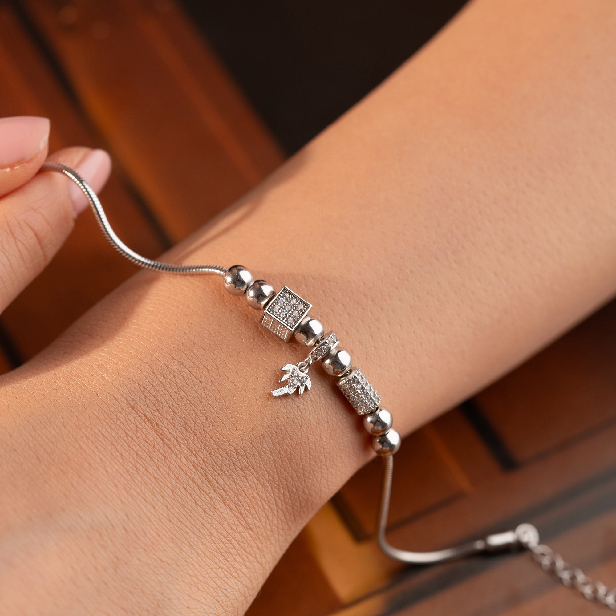 CHARMARMBAND MED PALMBERLOCK | 925 SILVER